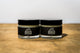 Muscle Butter USA recovery balm jar and lid side by side product photography